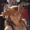 Woman In Brown Beaded Hat